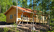 Nyopført sommerhus ved sø Nyopført sommerhus ved sø
